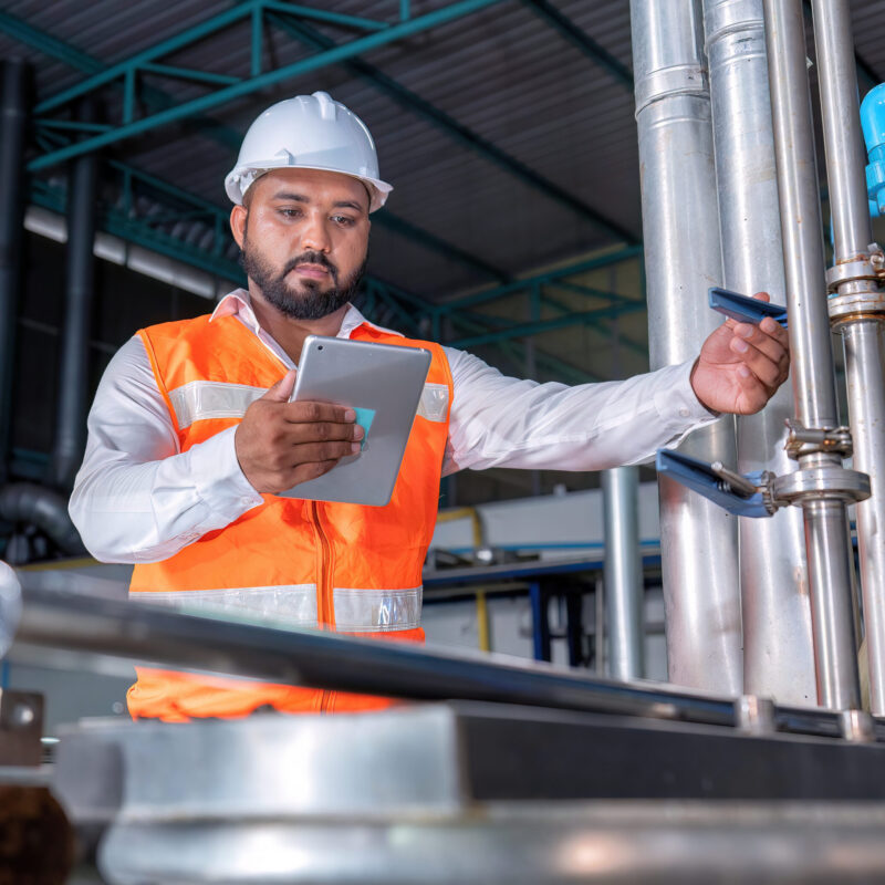 Mechanical engineer inspection pipe tube connection commissioning ready for plant startup machine